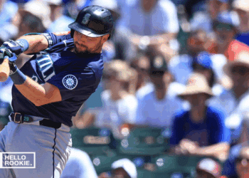 Cal Raleigh of the Seattle Mariners leads MLB in home runs as they face the Yankees at Yankee Stadium.