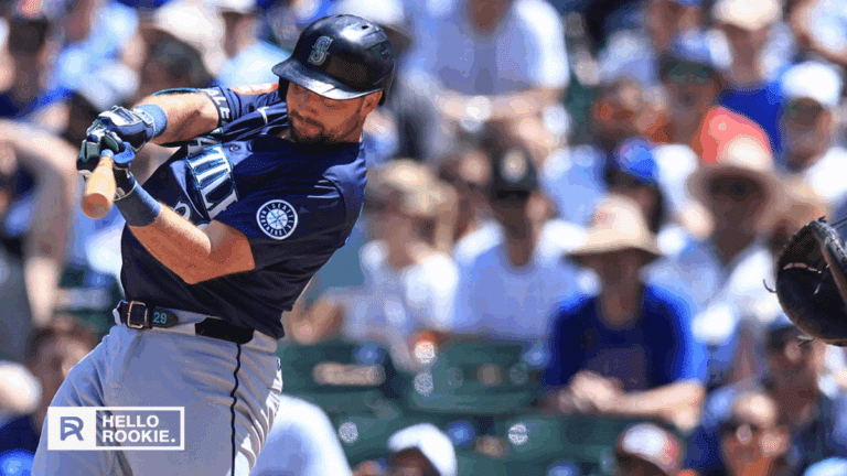 Cal Raleigh of the Seattle Mariners leads MLB in home runs as they face the Yankees at Yankee Stadium.