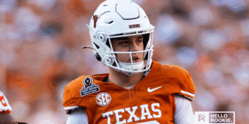 Arch Manning of the Texas Longhorns prepares for his first road start against the Ohio State Buckeyes at Ohio Stadium.