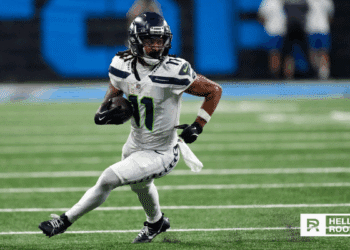 Jaxon Smith-Njigba of the Seattle Seahawks runs a route against the Arizona Cardinals defense on Thursday Night Football