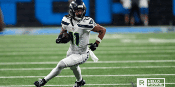 Jaxon Smith-Njigba of the Seattle Seahawks runs a route against the Arizona Cardinals defense on Thursday Night Football