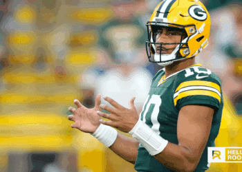 Jordan Love of the Green Bay Packers drops back to pass against the Washington Commanders on Thursday Night Football.