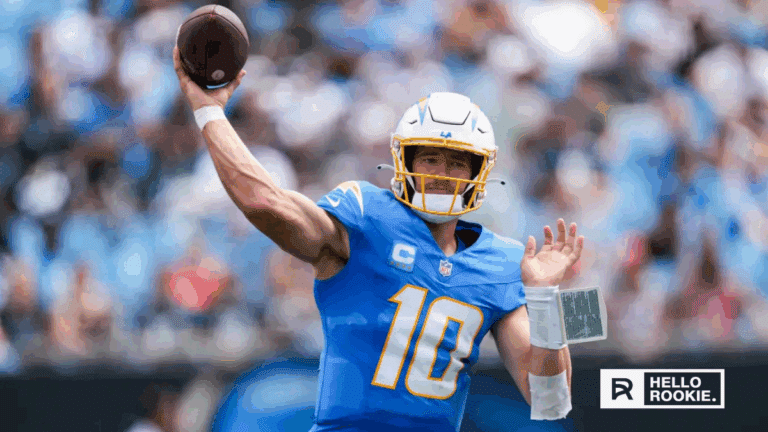 Justin Herbert of the Los Angeles Chargers drops back to pass against the Las Vegas Raiders in a key AFC West matchup.