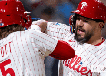 Kyle Schwarber of the Philadelphia Phillies swings for power against the New York Mets at Citizens Bank Park.