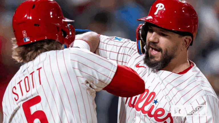 Kyle Schwarber of the Philadelphia Phillies swings for power against the New York Mets at Citizens Bank Park.