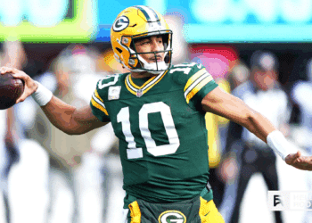 Jordan Love of the Green Bay Packers looks to stay hot as they take on the Detroit Lions at Ford Field on Thanksgiving Day.