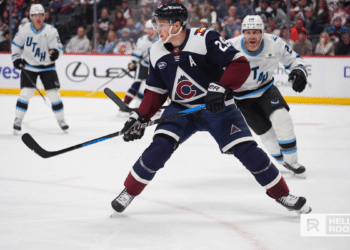 Nathan MacKinnon of the Colorado Avalanche leads the charge against the Ottawa Senators in their final matchup of the season.