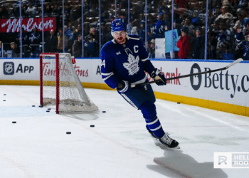 Auston Matthews of the Toronto Maple Leafs fires a shot as Toronto faces the New Jersey Devils at Prudential Center.