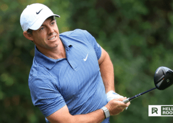 Rory McIlroy unleashes a powerful drive off the tee at Augusta National during the Masters Tournament.