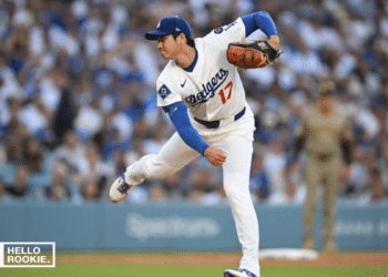 Shohei Ohtani of the Los Angeles Dodgers watches the ball after a powerful swing during an MLB game.