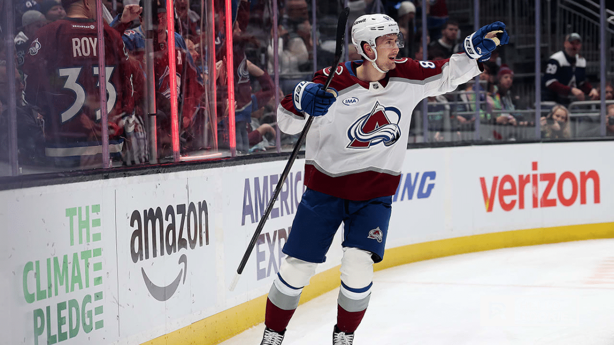 Martin Necas of the Colorado Avalanche handles the puck against the Calgary Flames at Ball Arena