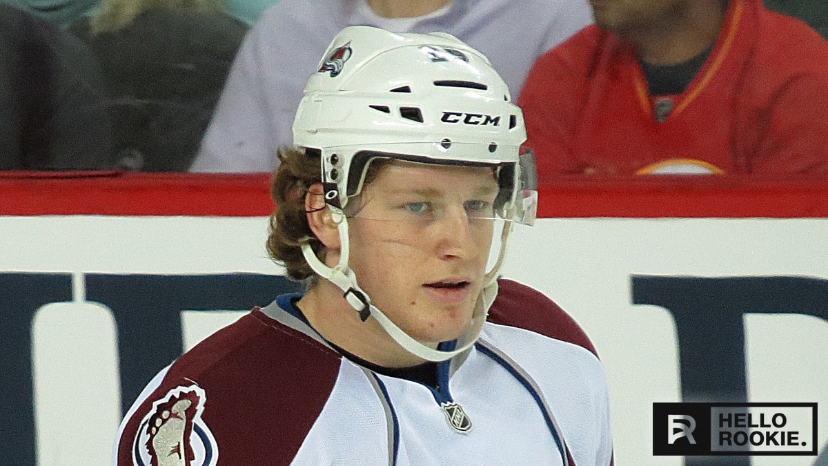 Nathan MacKinnon skating for the Colorado Avalanche during an NHL game