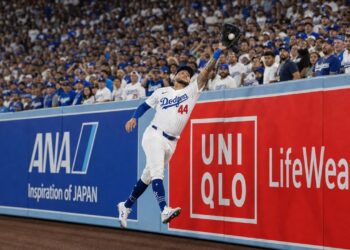 Andy Pages of the Los Angeles Dodgers making a play against the Philadelphia Phillies