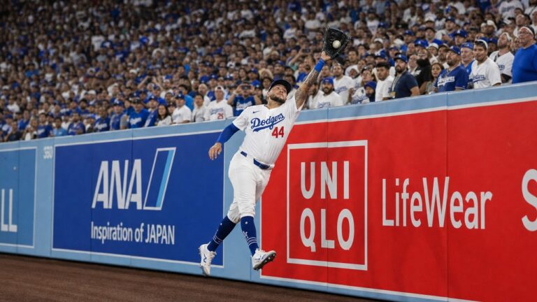 Andy Pages of the Los Angeles Dodgers making a play against the Philadelphia Phillies