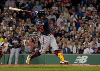Ronald Acuna Jr. mid-swing for the Atlanta Braves at Fenway Park