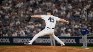 Gerrit Cole pitching for the New York Yankees at Yankee Stadium