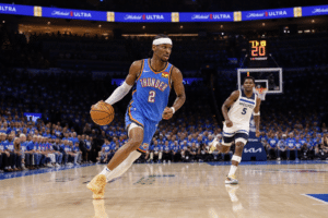 Shai Gilgeous-Alexander driving to the basket for the Oklahoma City Thunder