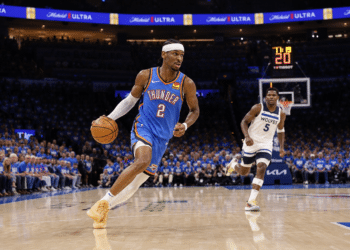 Shai Gilgeous-Alexander driving to the basket for the Oklahoma City Thunder