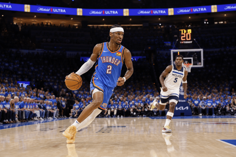 Shai Gilgeous-Alexander driving to the basket for the Oklahoma City Thunder