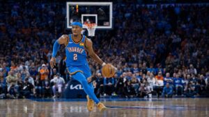 Shai Gilgeous-Alexander driving to the basket for the Oklahoma City Thunder