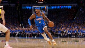 Shai Gilgeous-Alexander driving to the basket for the Oklahoma City Thunder