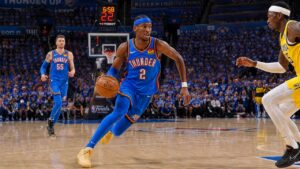 Shai Gilgeous-Alexander driving to the basket for the Oklahoma City Thunder