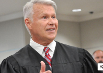 US District Judge William M. Conley