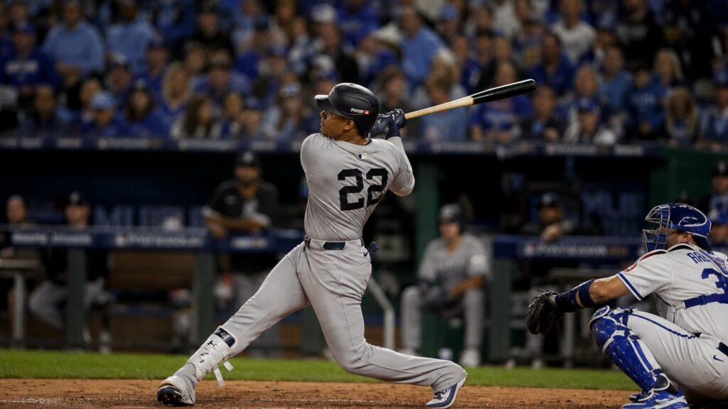 Juan Soto mid-swing for the New York Yankees at Kauffman Stadium