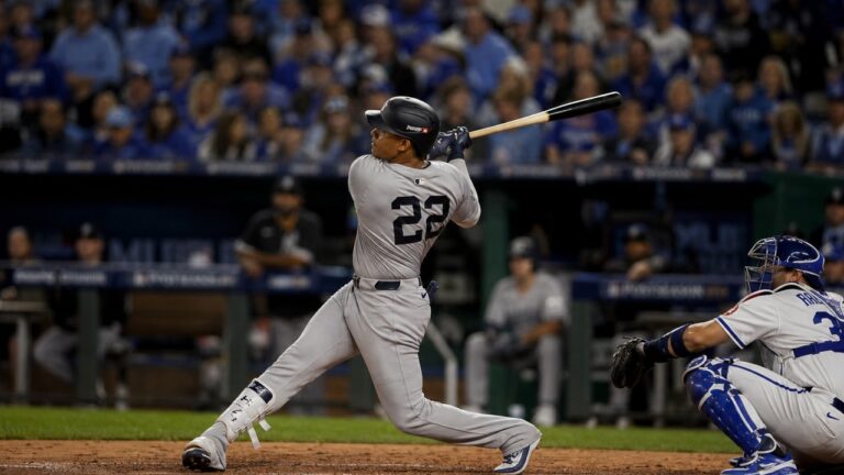 Juan Soto mid-swing for the New York Yankees at Kauffman Stadium
