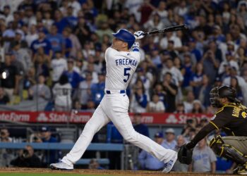 Freddie Freeman following through on a powerful swing for the Los Angeles Dodgers at Dodger Stadium
