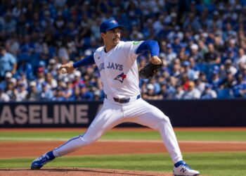 Dylan Cease pitching for the Toronto Blue Jays