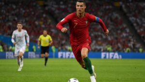 Soccer player in red national team jersey at the 2026 FIFA World Cup