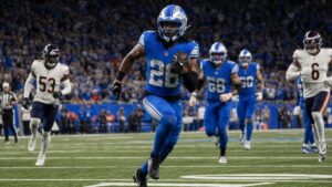 Jahmyr Gibbs running with the football for the Detroit Lions