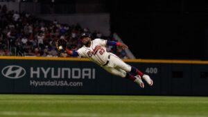 Michael Harris II making a diving catch in center field for the Atlanta Braves