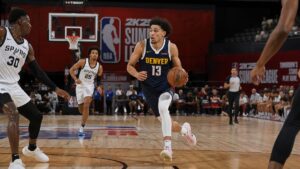 Bryce Hopkins driving to the basket for the Denver Nuggets in NBA Summer League action