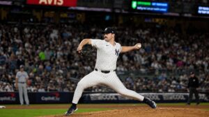 Carlos Rodon pitching for the New York Yankees at Yankee Stadium