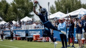 Carnell Tate making a leaping catch during Tennessee Titans training camp