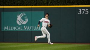 Chase DeLauter tracking a fly ball for the Cleveland Guardians
