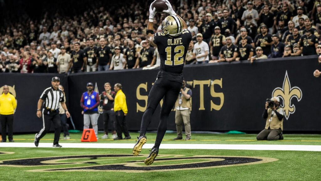 Chris Olave making a catch for the New Orleans Saints