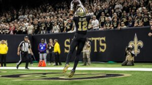 Chris Olave making a catch for the New Orleans Saints