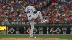 Christian Scott pitching for the New York Mets against the Philadelphia Phillies