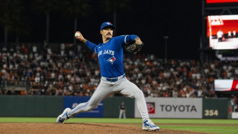 Dylan Cease pitching for the Toronto Blue Jays