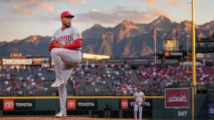Hunter Greene pitching for the Cincinnati Reds against the Colorado Rockies