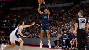Karim Lopez shooting a jump shot for the Memphis Grizzlies in NBA Summer League