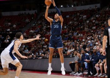 Karim Lopez shooting a jump shot for the Memphis Grizzlies in NBA Summer League