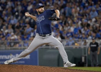 Tampa Bay Rays pitcher delivering a pitch on the mound at Kauffman Stadium