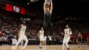 Danny Wolf finishing at the rim for the Brooklyn Nets during NBA Summer League action