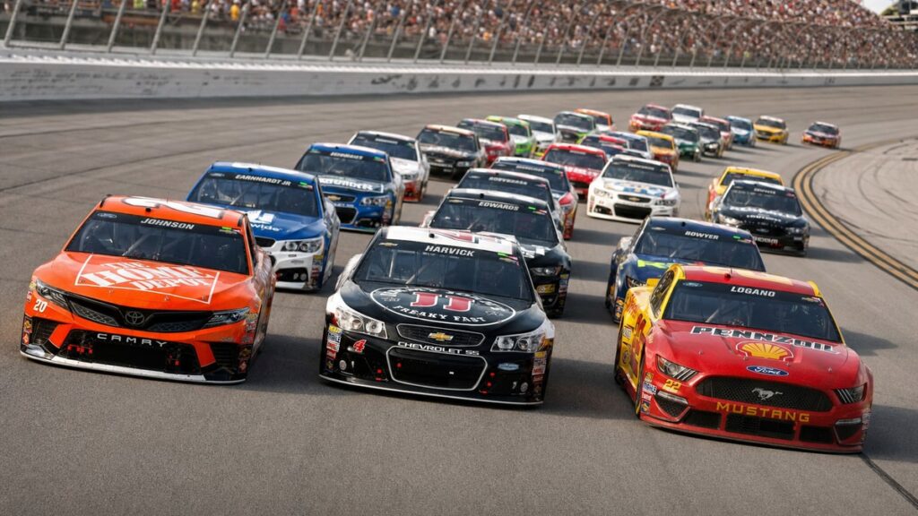 NASCAR Cup Series cars drafting in a tight pack during a superspeedway-style race