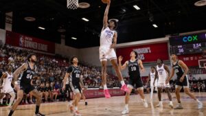Rasheer Fleming rising for a rebound for the Phoenix Suns in NBA Summer League