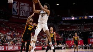 Trevon Brazile grabbing a rebound for the Denver Nuggets in NBA Summer League